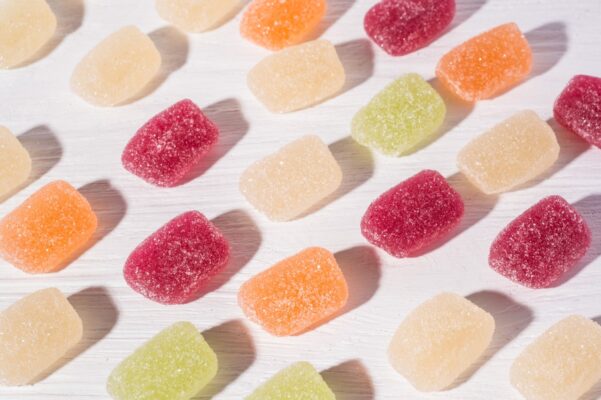 About Us 2 colorful gummies on white background 601x400